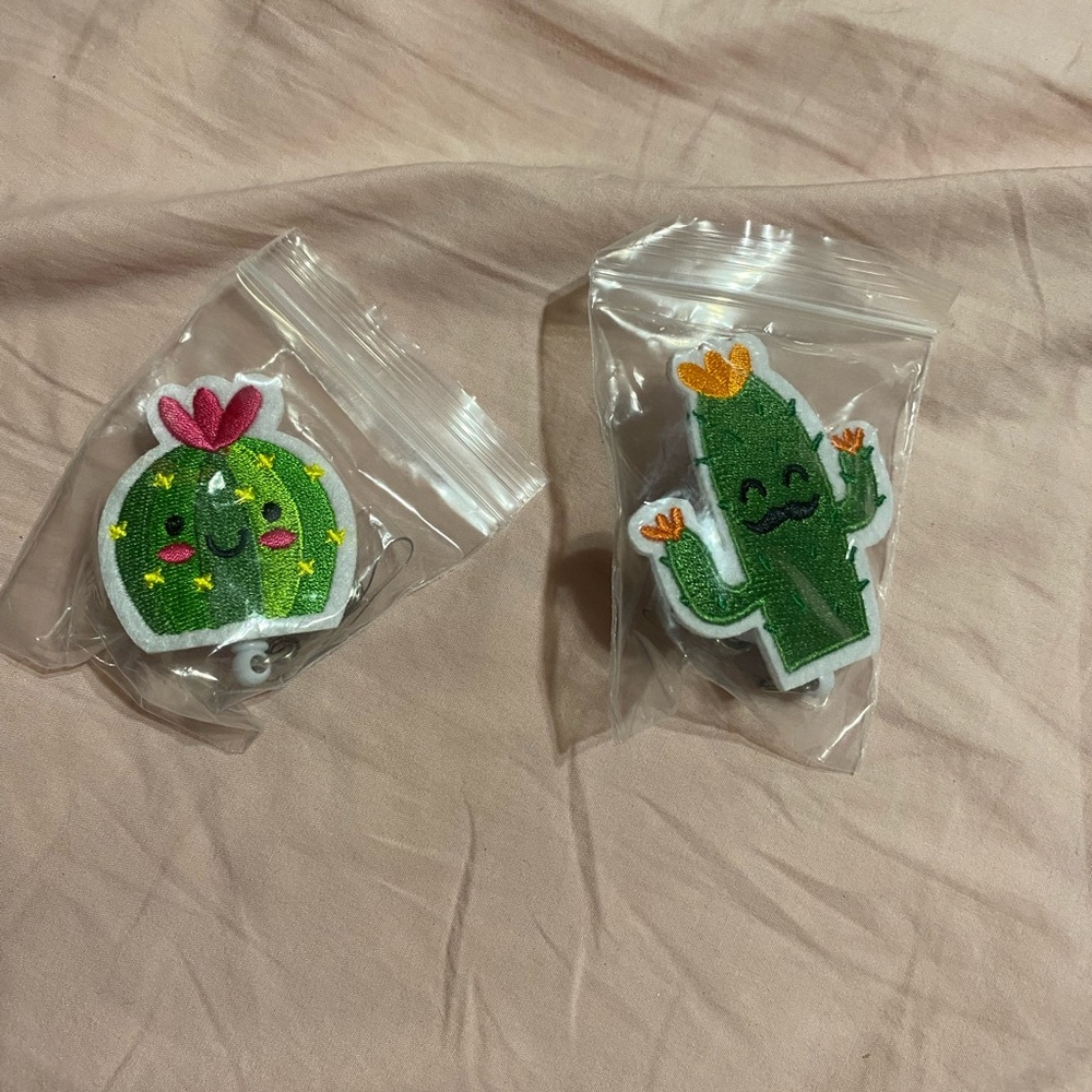 Badge reel holders